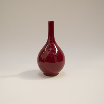 A Chinese Jun-type red glazed long-necked vase