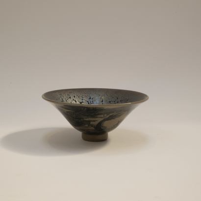 A Chinese flamb- glazed tea cup
