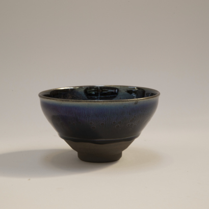 A Chinese flamb- glazed tea cup