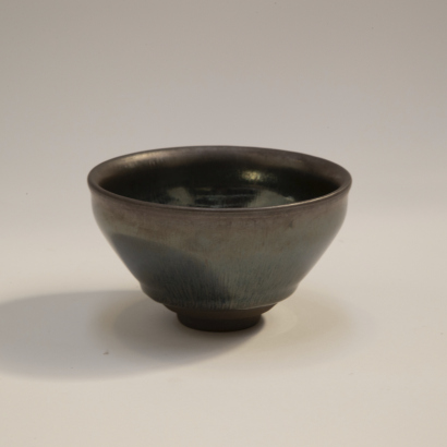 A Chinese flamb- glazed 'hare's fur' tea cup