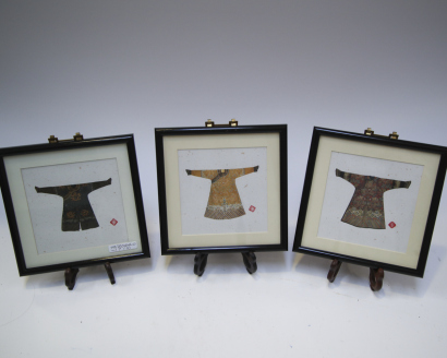 A group of three Chinese Qing dynasty 'dragon' robe piece (prints)