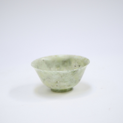 A Chinese green jade bowl