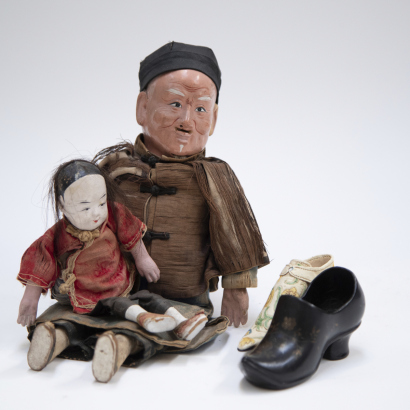 Four Chinese Qing Dynasty cloth dolls with shoes