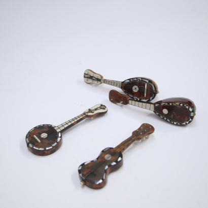 Four small musical instruments made from sea turtle shells in China