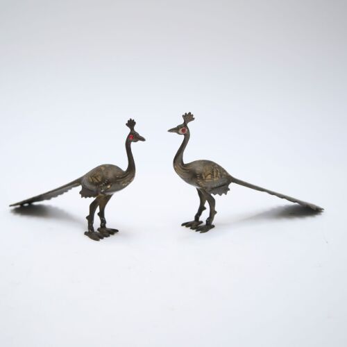A pair of modern bronze peacocks