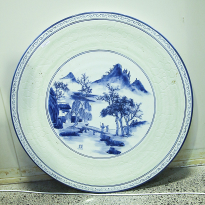 A Chinese 20th-century blue and white' landscape' round table top