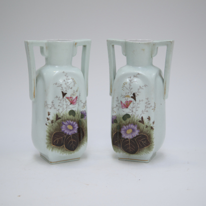 A pair of Chinese Hunan Imperial Mausoleum porcelain handled vases