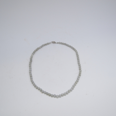 A Chinese jade bead necklace