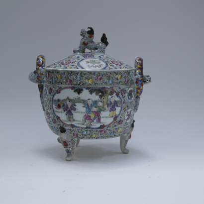 A Chinese Famille rose 'baby play' dragon handled covered Jar