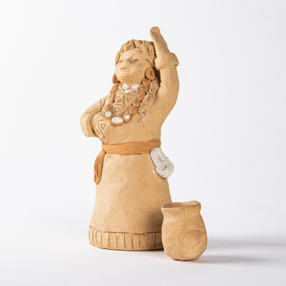 A Chinese clay sculpture of young Tibetan girl