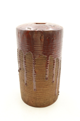 A Chinese brown-glazed money-saving jar
