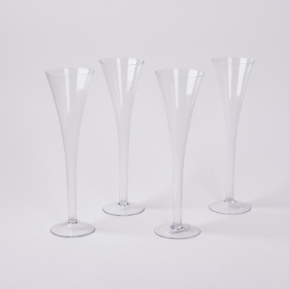 A Set Of Four Elegant Hollow Stemmed Champagne Flutes