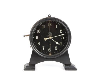 A 1920s English Black Lacquered Metal Shelf Clock