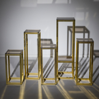 A Collection of Five Pierre Vandel Brass and Smoked Glass Side Tables