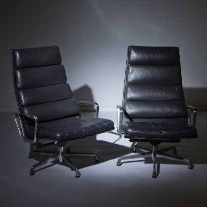 A Pair of Charles and Ray Eames Soft Back Recliner Chairs