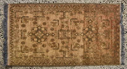 A Small Hand Knotted Rug