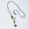 A Chinese old jade-carved bird pendant