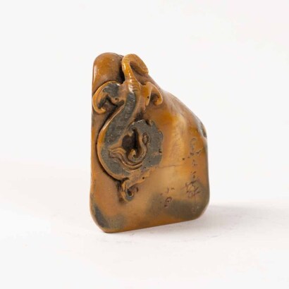 A Chinese inscribed Shoushan soapstone 'chilong' seal