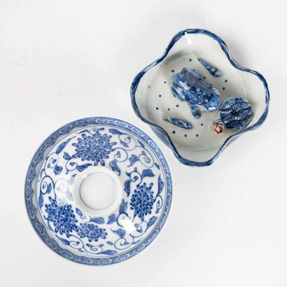 A Japanese Nabeshima blue and white covered bowl+A Japanese blue and white frog on lotus leaf ornament