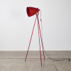 A Floorstanding Tripod Lamp In Red