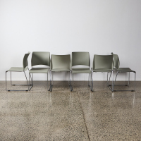 A Pair Of Patra Steel Framed Grey Plastic Shell Chairs