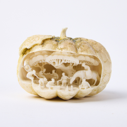 A Carved Pumpkin Figurine