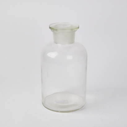 A Tall Science Jar With Lid