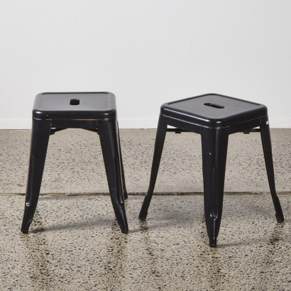 A Pair Of Black Industrial Stools