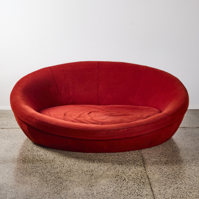 A Large Oval Lounge Love Seat In Red