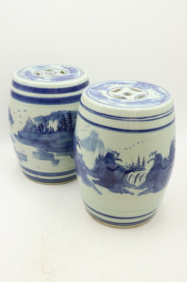 Two Chinese 20th century blue and white 'landscape' embroidered stools