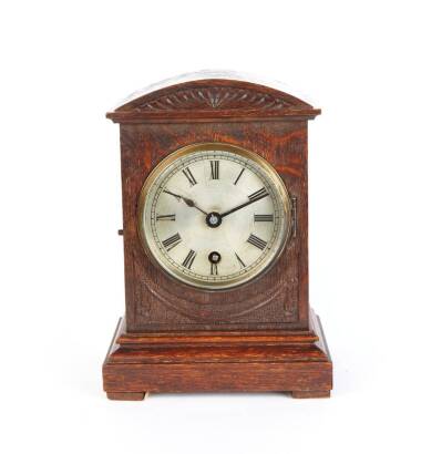 A Victorian Oak Cased Small Bracket Style Clock with Silver Dial