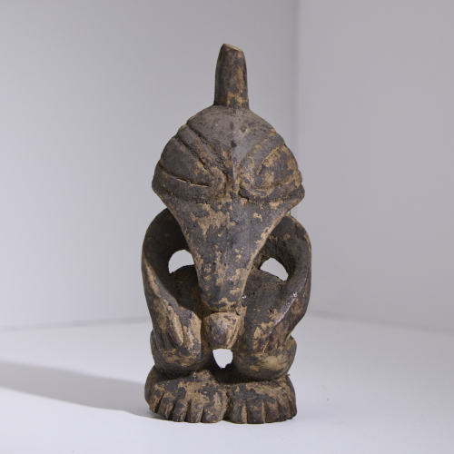 A Small Carved Sepik Figure, Papua New Guinea