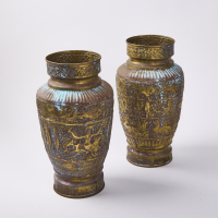 A Pair Of Illustrative Pressed Bronze Vases