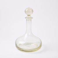 A Vintage Glass Round Bottom Decanter With Large Stopper