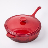 A Large Red Cast Iron Frypan