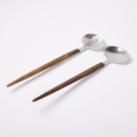 A Pair Of Mid Century Salad Servers