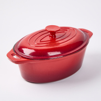 A Cast Iron Oval Casserole Dish With Lid