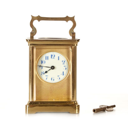 An Antique Brass Cased Carriage Clock with Enamel Face and Blue Numerals 