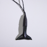 A Pounamu Whale Tail Pendant