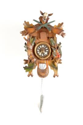 A German Black Forest Carved and Painted Cuckoo Wall Clock