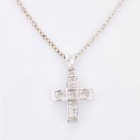 18ct White Gold, .47ct Diamond Cross on 45cm Silver Plated Chain