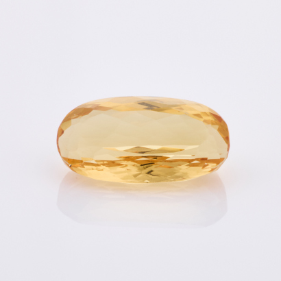 A Loose Oval Mixed cut, 5.73ct Yellow Topaz Gemstone