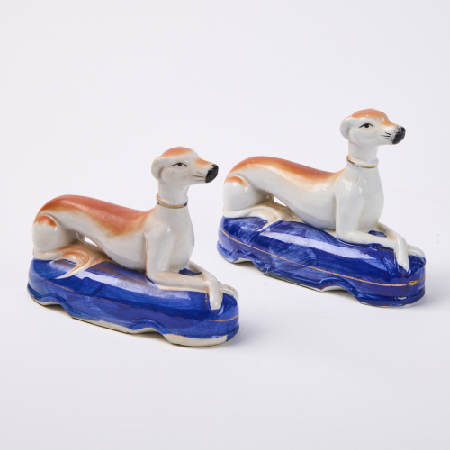 A Pair Of Ceramic Greyhounds