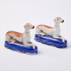 A Pair Of Ceramic Greyhounds
