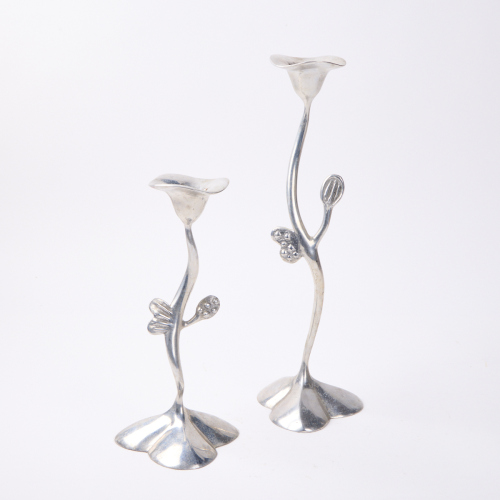 A Pair Of Matthew Von Sturmer Polished Aluminium Candlesticks