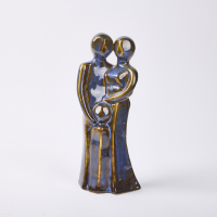 A Blue Glazed Familial Ceramic Statue