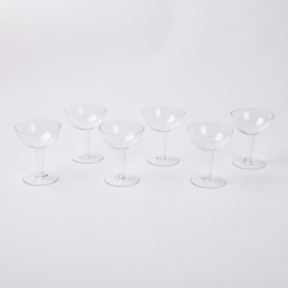 A Set Of Six Hollow Stem Champagne Coupes