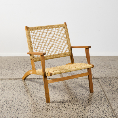 A Wooden Chair with Woven Seat and Back Rest