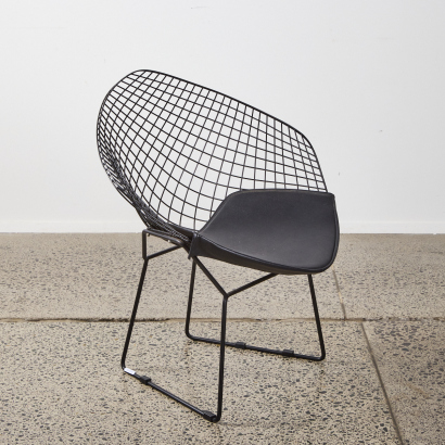 A Black Diamond Chair in the style of Harry Bertoia