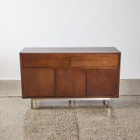 A Three Door Wooden Sideboard